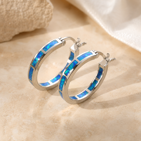 Boucles d'oreilles en cercle avec opale de feu bleue – photo 1/2